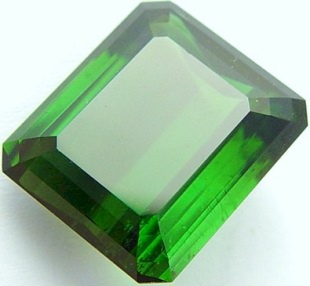 Emerald cut green tourmaline gemstone, exclusive loose faceted tourmalines, Madagascar gemstones shopping